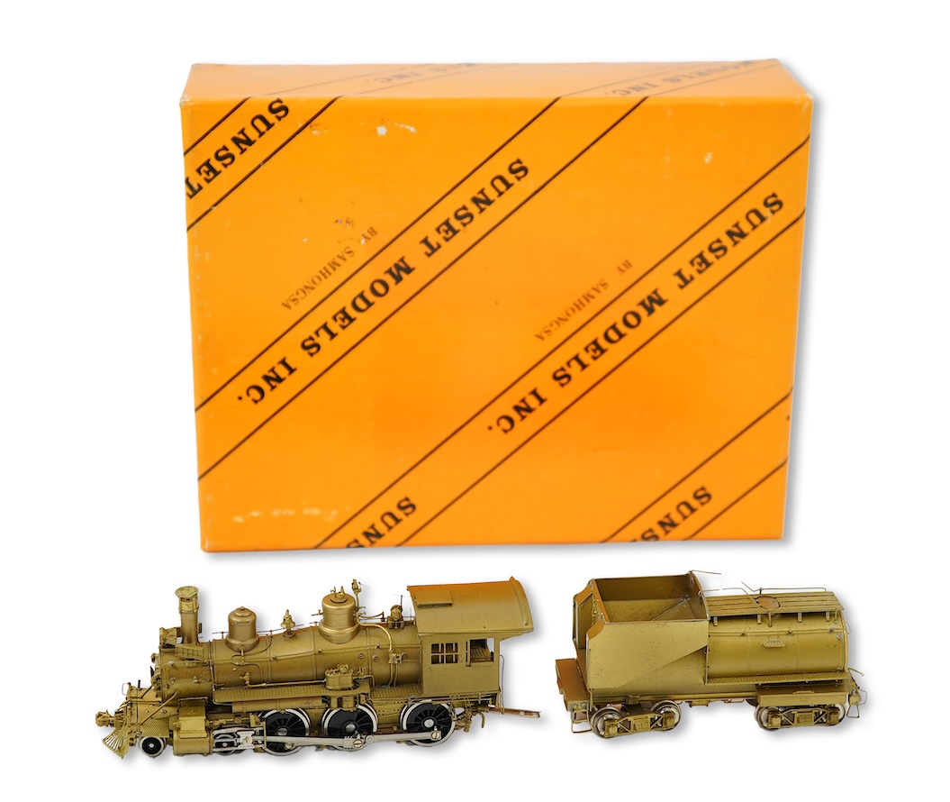 A boxed HO gauge Sunset Models unpainted brass model of Union Pacific 1242 4-6-0 locomotive with bogie tender, powered for two rail operation.
